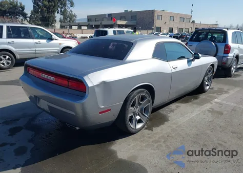 2013 Dodge Challenger Sxt z USA, uszkodzony, nr VIN 2C3CDYAG5DH724056